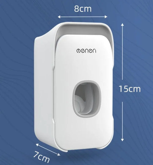 Automatic toothpaste dispenser in blue colour mounted on bathroom wall