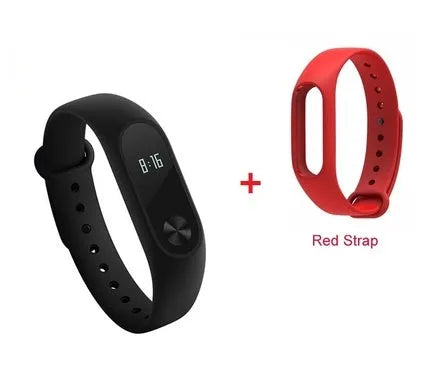 Xiaomi Mi Band 2 black smartband on wrist showing OLED display with heart rate and step count.