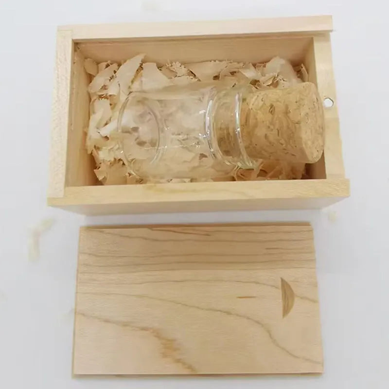 Transparent wooden wish bottle USB drive showing internal wood element, 60mm long.