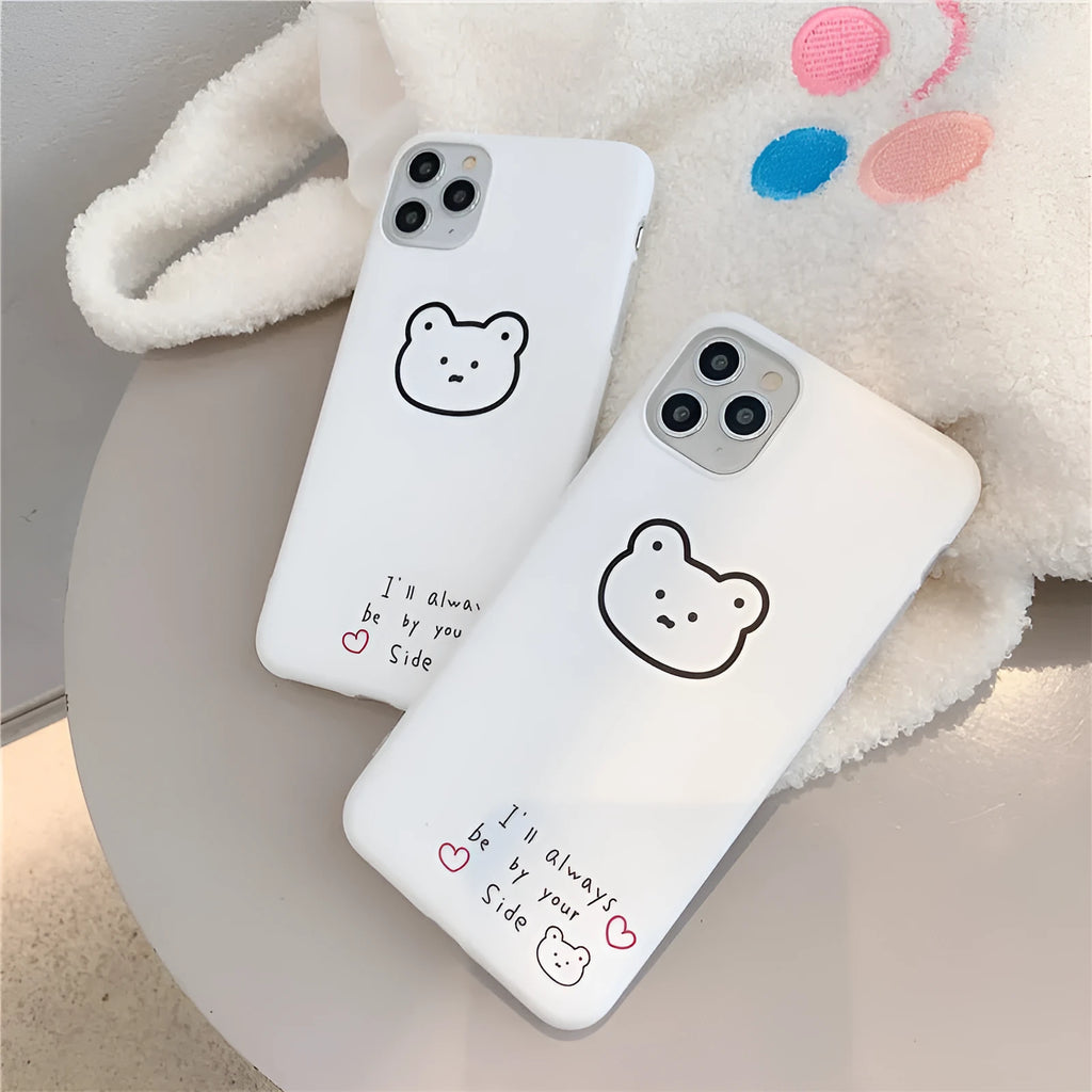 Soft silicone Apple iPhone case with a Korean bear cartoon design on the back.
