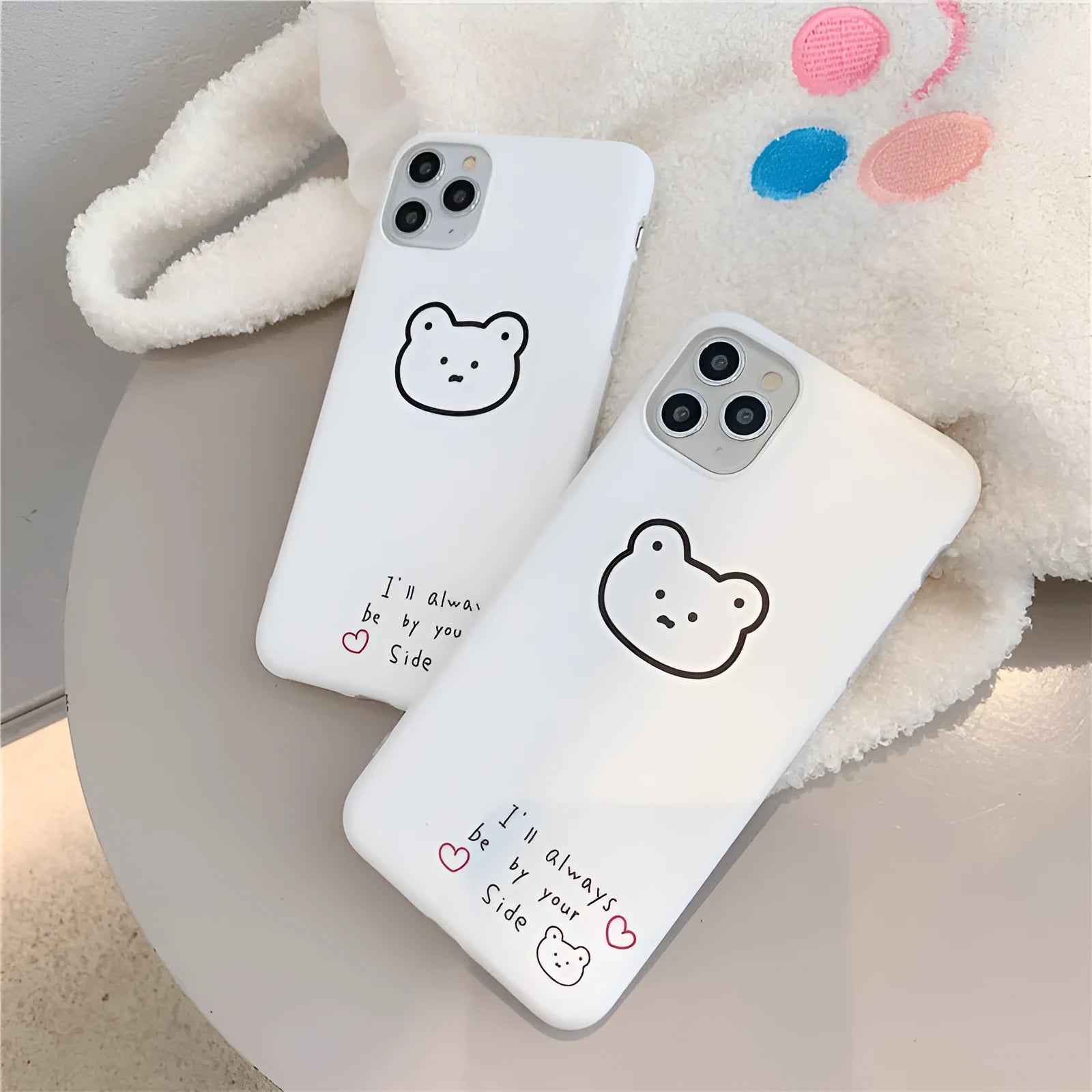 Soft silicone Apple iPhone case with a Korean bear cartoon design on the back.