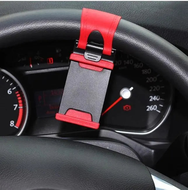 Black steering wheel phone clip mount holding smartphone for car navigation