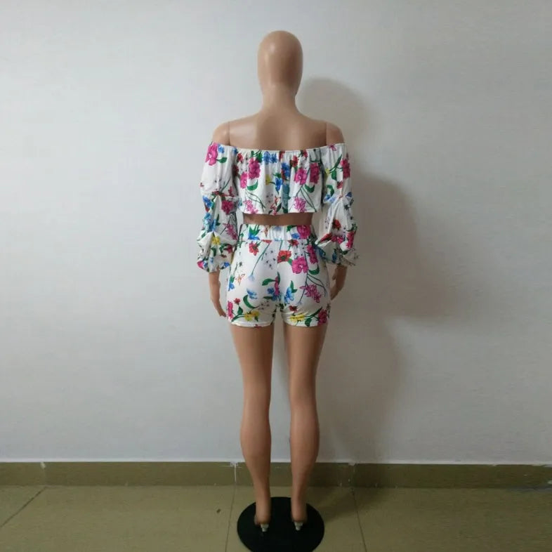 Multicolour digitally printed women's two-piece lounge set with pile sleeves and shorts.