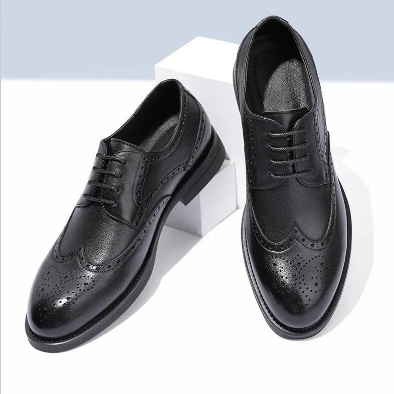 Men's black and brown brogue leather shoes in business style with traditional detailing