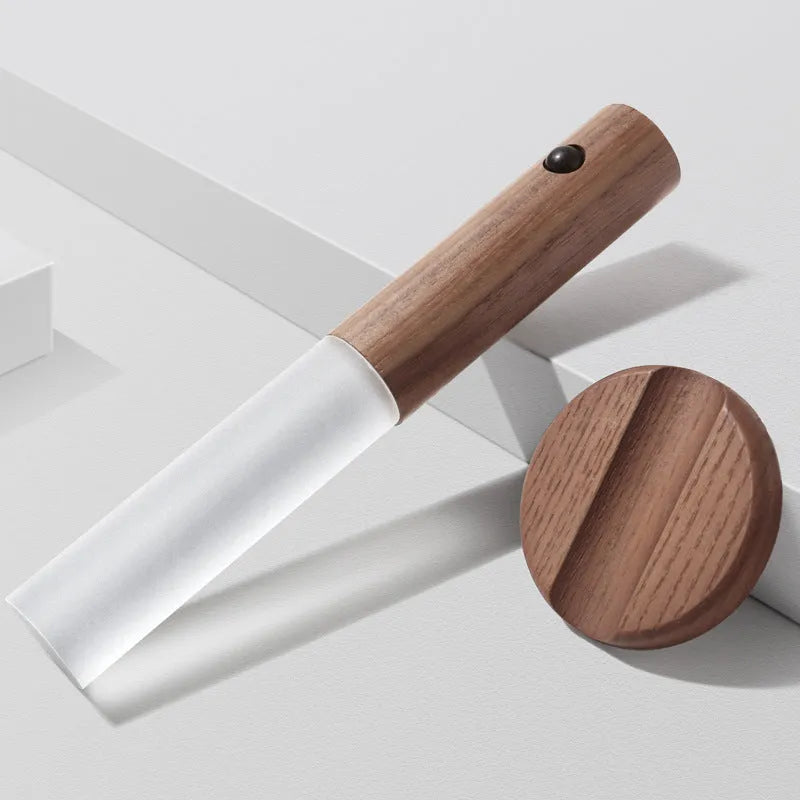Compact smart sensor LED desk lamp made of solid wood and organic glass in coffee colour.