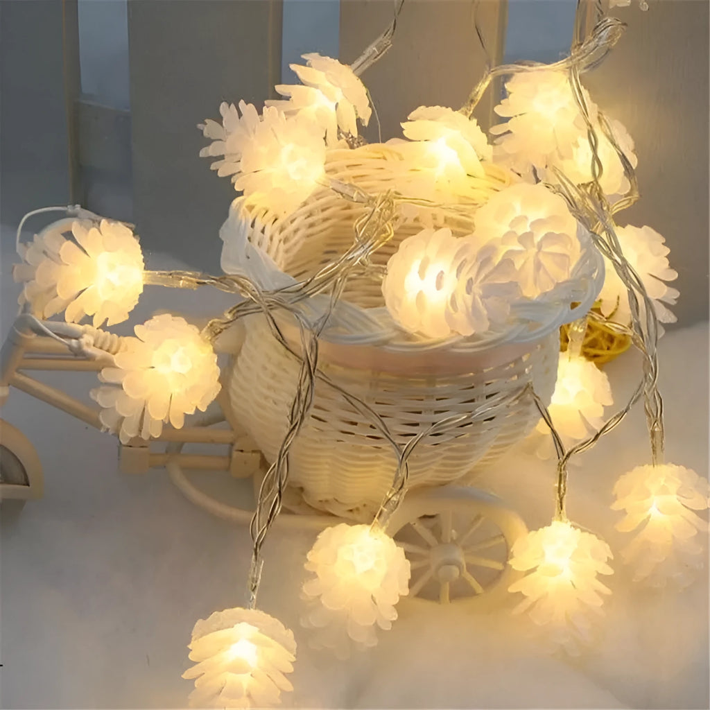 Battery-powered warm white LED pine cone light string for decorative indoor and outdoor use
