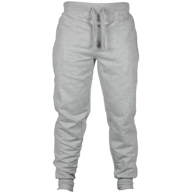 Men's black cotton fleece drawstring jogger pants laid flat, showing loose fit and flat front design.