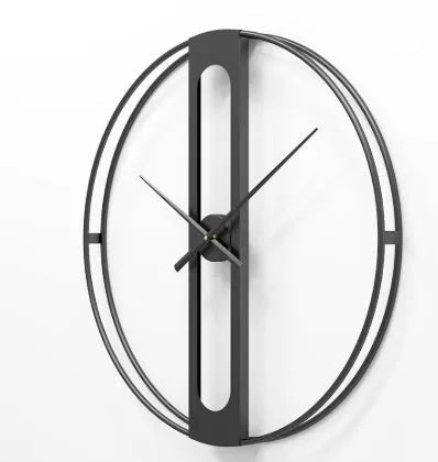 Large 50cm round metal wall clock in black or gold finish on a wall
