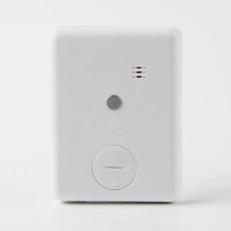 Magnetic kitchen timer with LCD screen showing time display, available in black and white colours
