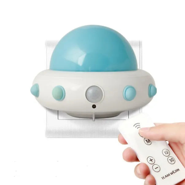 Remote control UFO shaped bedside night light in blue, pink or white colours
