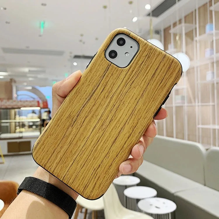 Slim wooden iPhone back cover in natural rosewood, teak, black rose, and walnut finishes