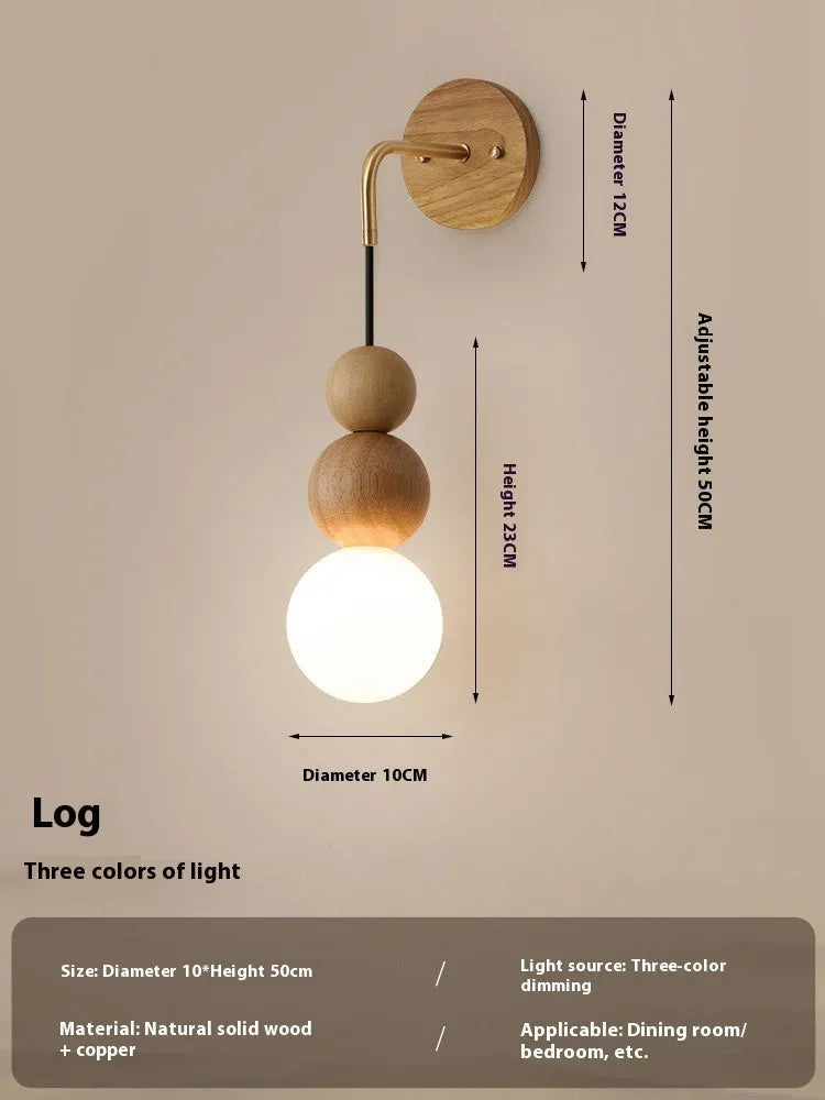 Walnut and copper suspension wall lamp with tri-colour light on a wall