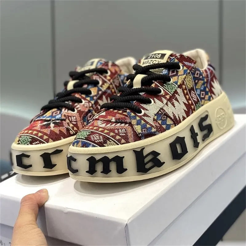 Men's low top printed board shoes in blue with cloth upper and rubber sole