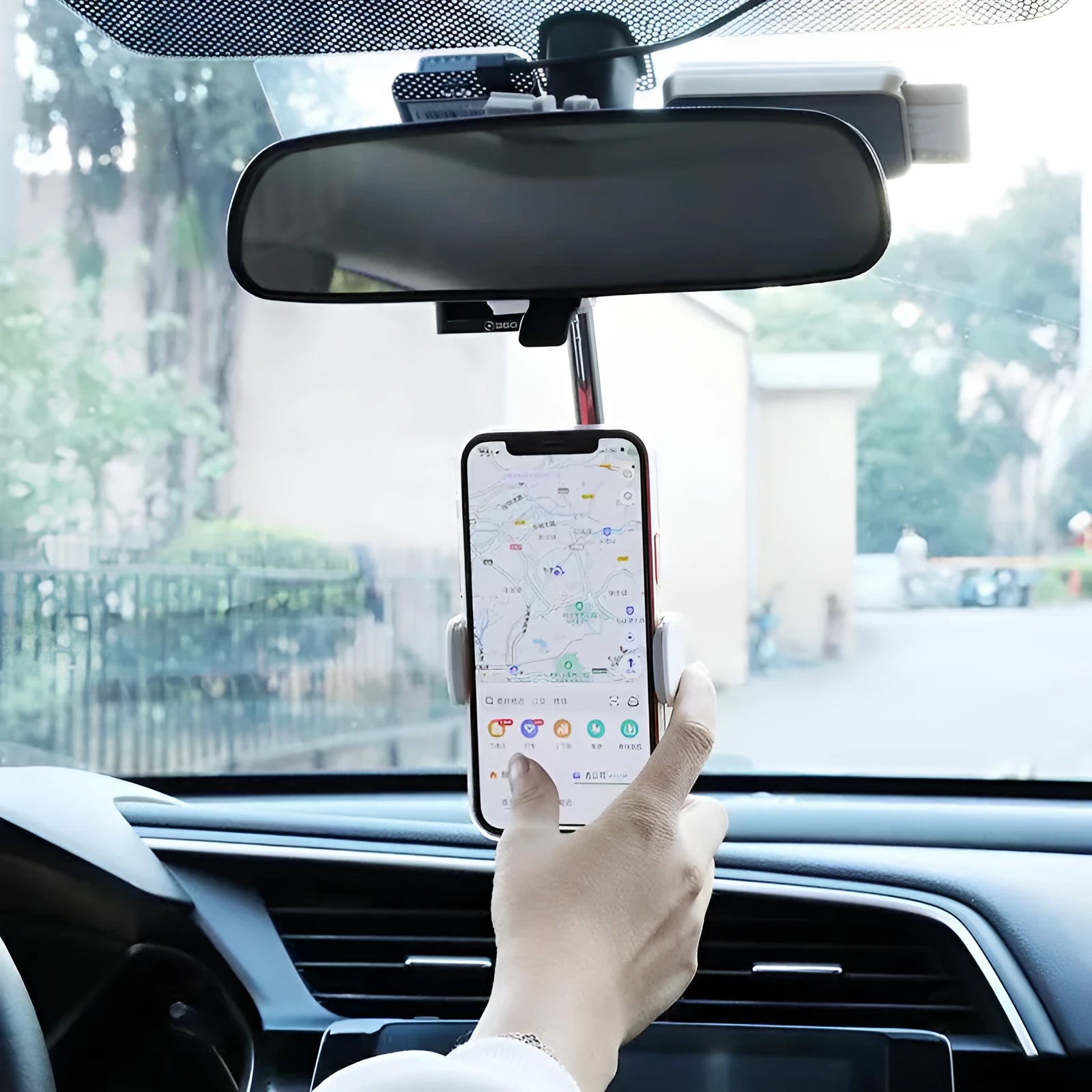 Black vehicle rearview mirror phone bracket showing adjustable arm and clip mechanism
