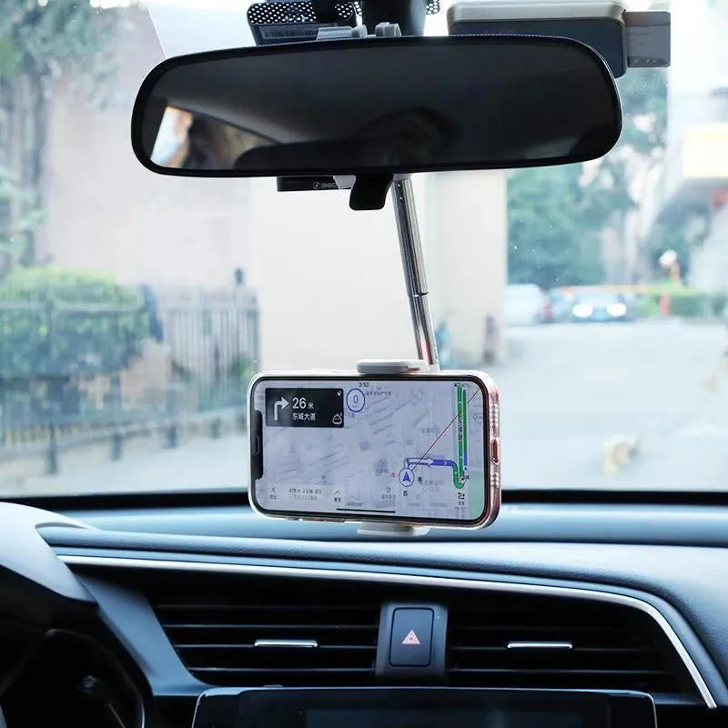 Black vehicle rearview mirror phone bracket showing adjustable arm and clip mechanism