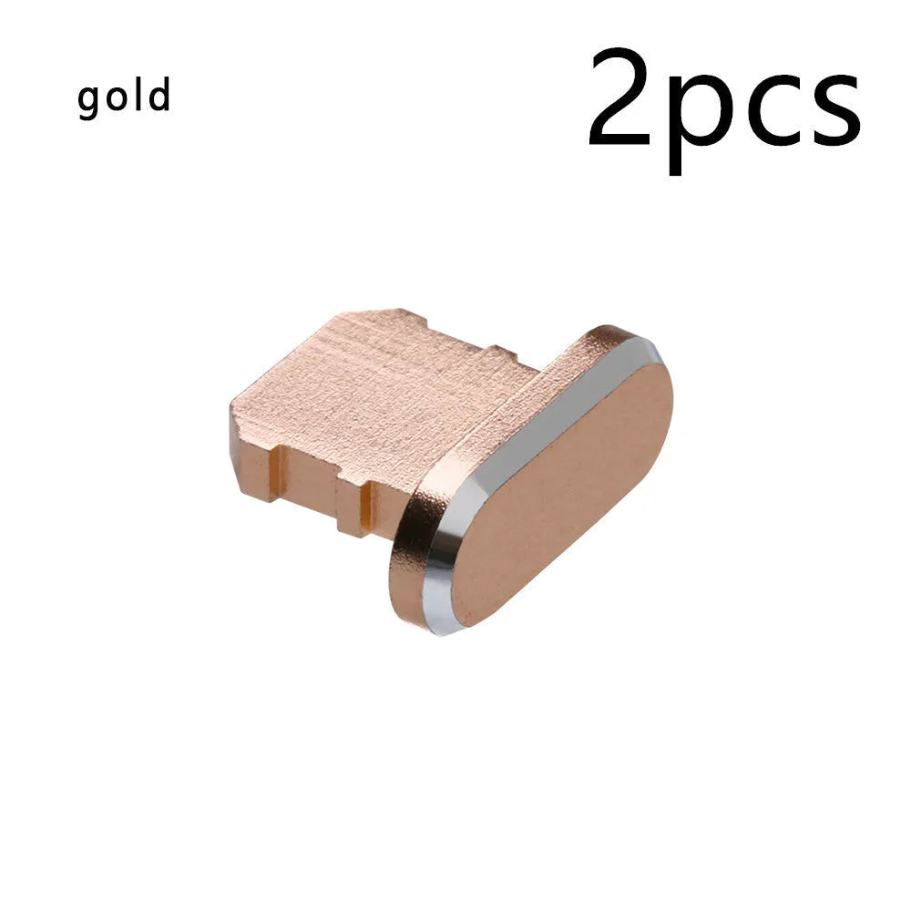 Aluminium alloy mobile phone charging port dust plug for iPhones, shown in rose gold colour.