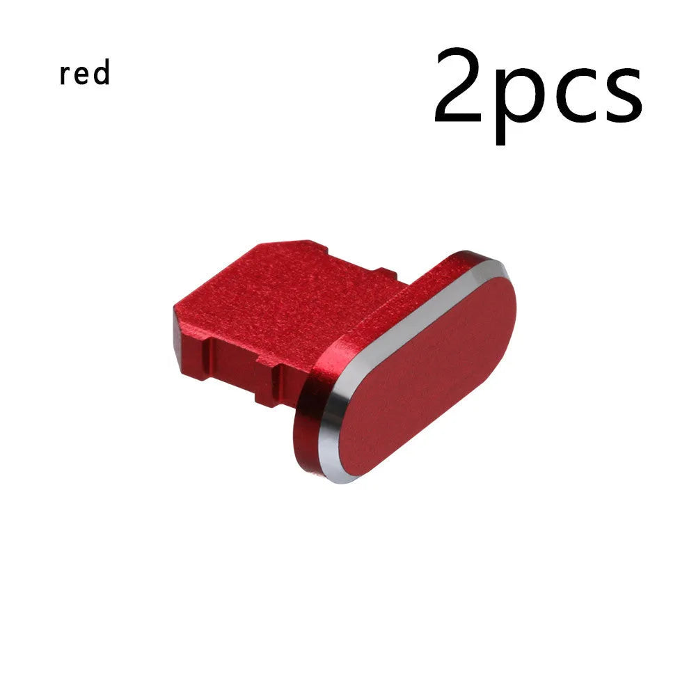 Aluminium alloy mobile phone charging port dust plug for iPhones, shown in rose gold colour.