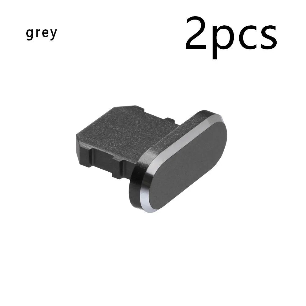 Aluminium alloy mobile phone charging port dust plug for iPhones, shown in rose gold colour.