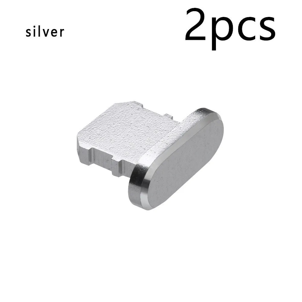 Aluminium alloy mobile phone charging port dust plug for iPhones, shown in rose gold colour.