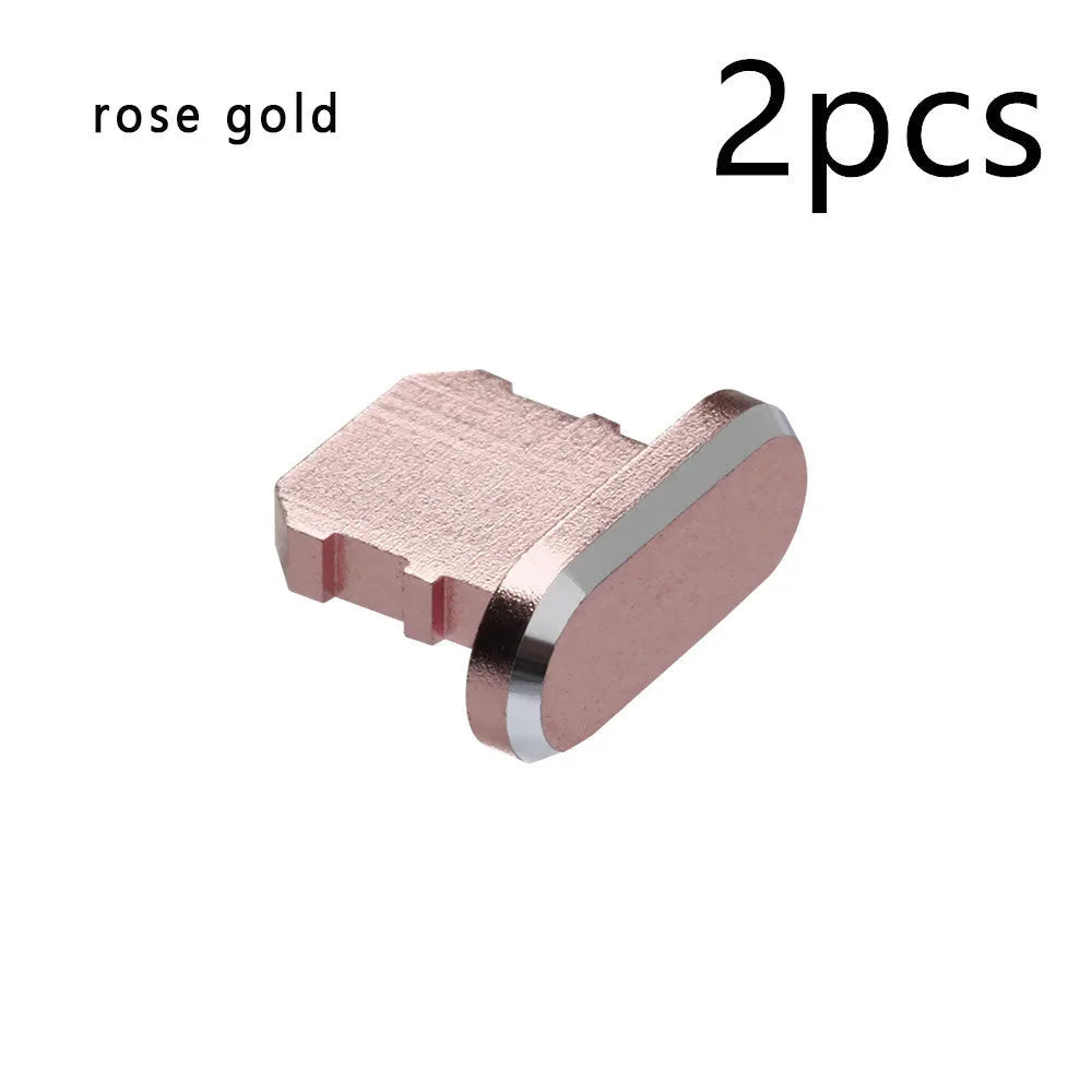 Aluminium alloy mobile phone charging port dust plug for iPhones, shown in rose gold colour.