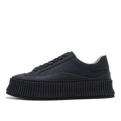 Women's thick sole platform sneakers with suede leather upper and cross-lace detailing