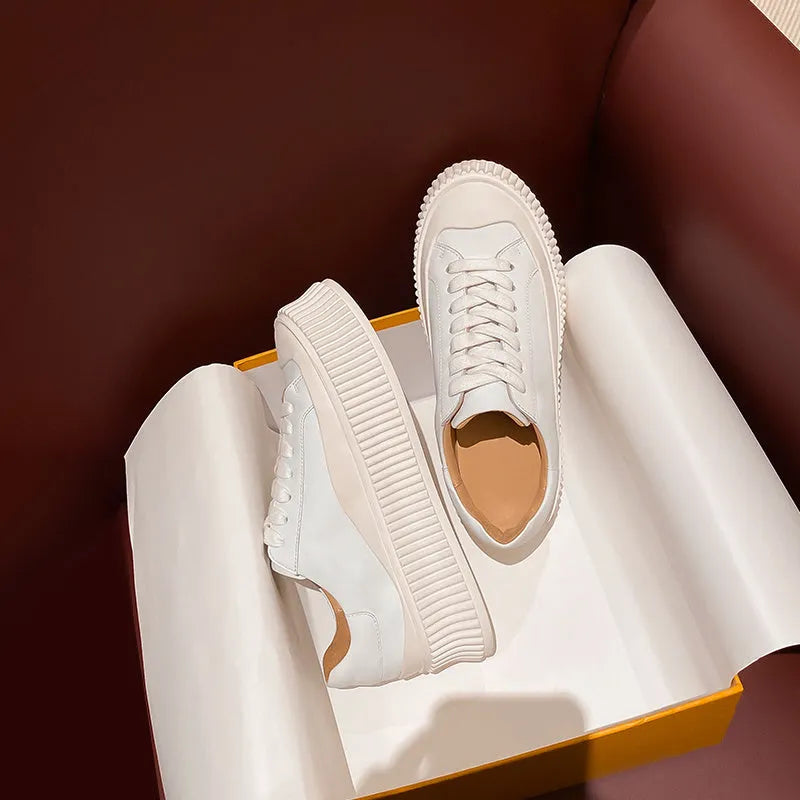 Women's thick sole platform sneakers with suede leather upper and cross-lace detailing