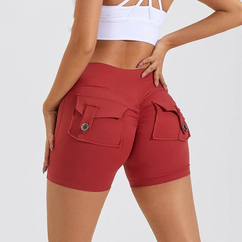 Women's high waist hip lifting sports shorts with side pockets in electric blue colour