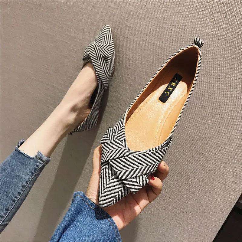 Women's pointed toe low heel flats in black and red colours with cotton upper