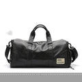 Large black waterproof PU leather sports training bag with a carry handle, shown open to reveal internal organiser pockets.