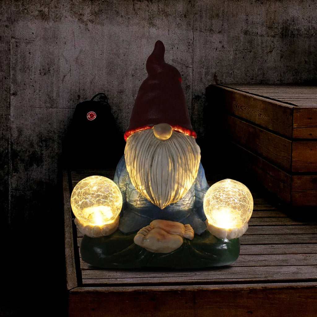 Solar LED resin dwarf garden ornament with faceless old man design, 27x20cm