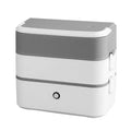 Double-layer portable heated lunch box with stainless steel tanks and plastic housing
