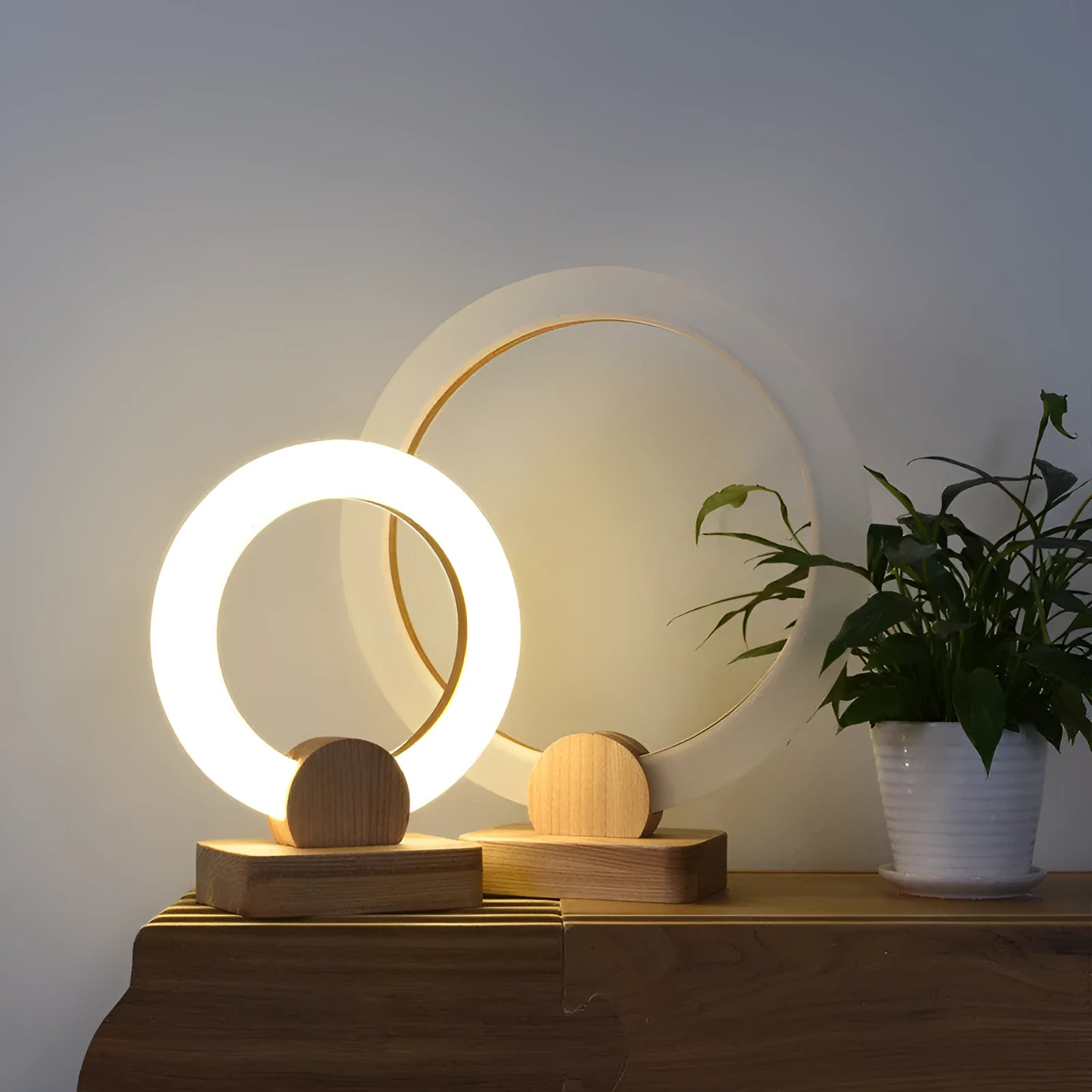 Nordic style wooden circular chandelier with acrylic shade and LED lighting in living room setting