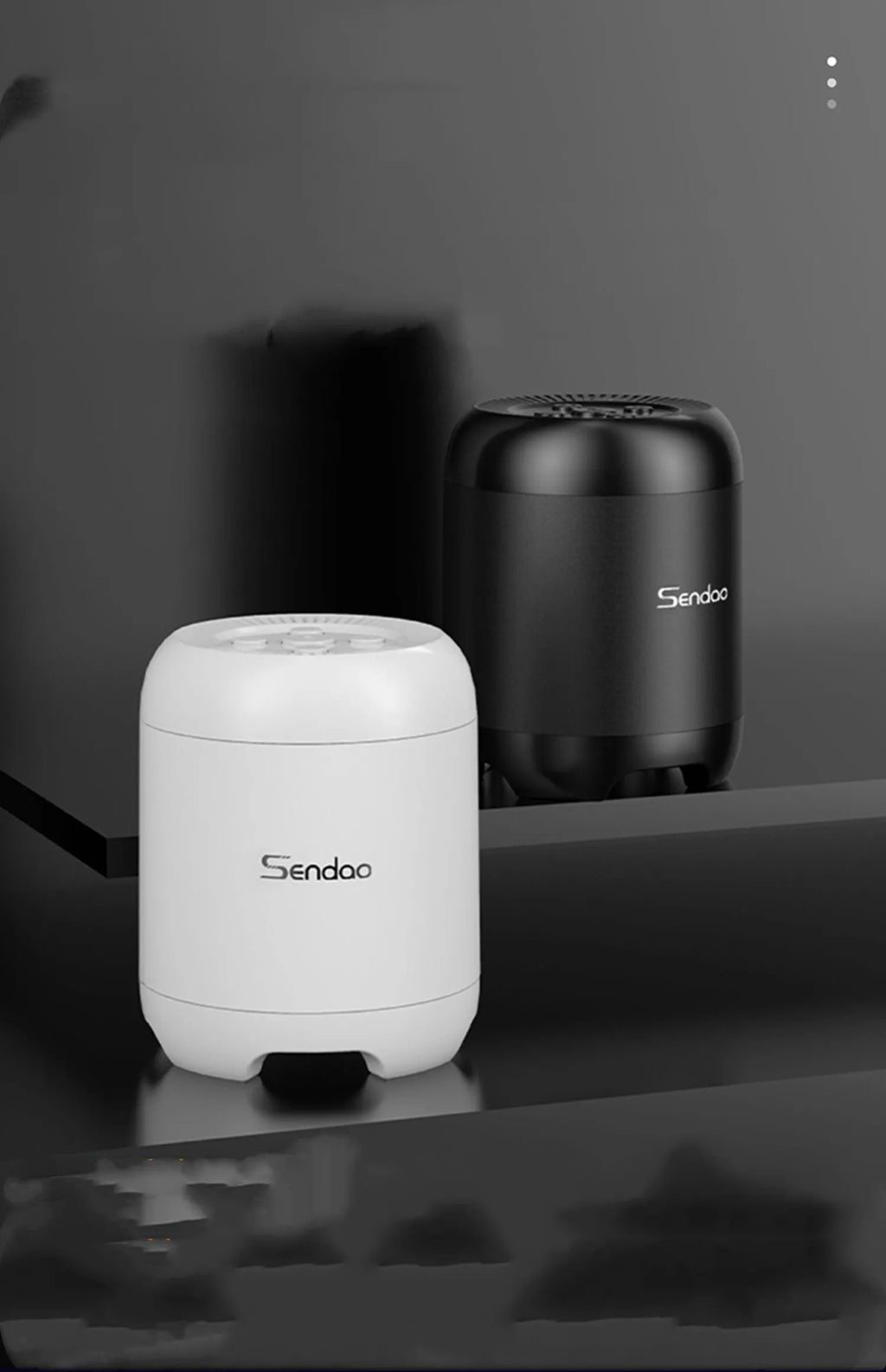 Compact black or white wireless Bluetooth speaker with subwoofer function and microSD card slot