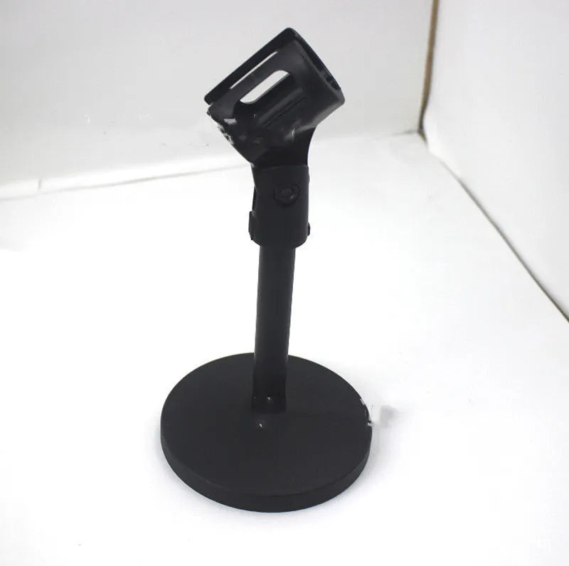 Black metal desktop microphone stand with a 10.5cm base and plastic microphone clip.
