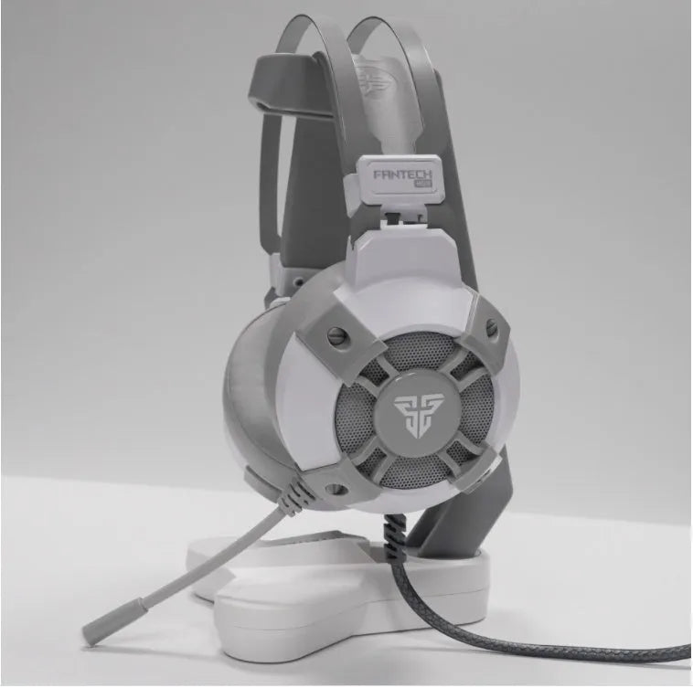 Black FANTECH HG11 USB gaming headset with RGB LED lights and a remote control on its cable.