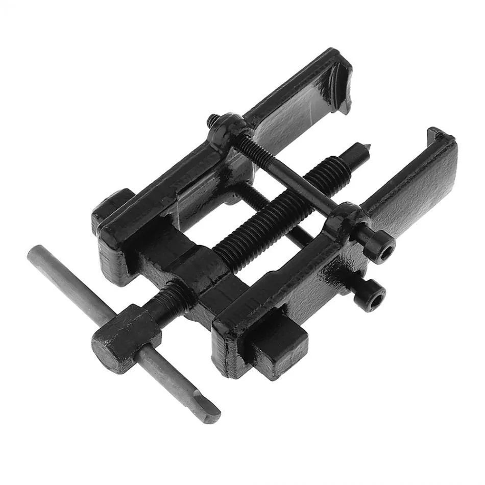 Forged steel two-jaw bearing puller with black finish, showing steel plate and jaws
