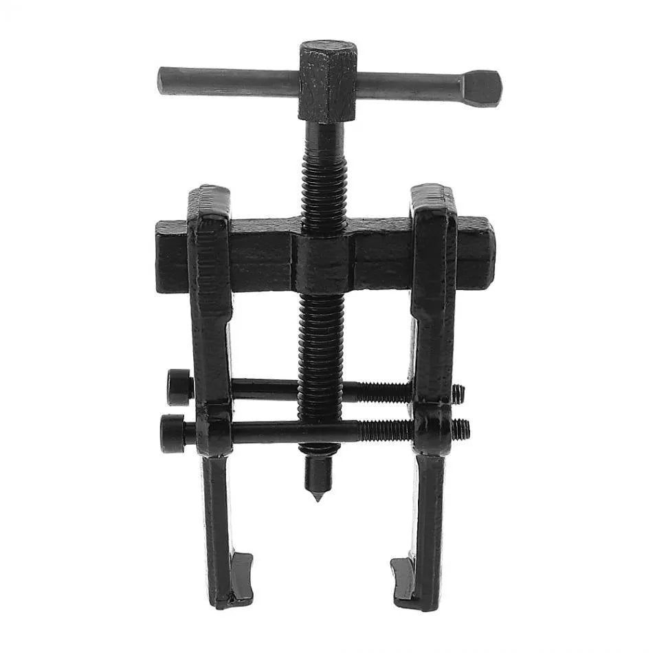 Forged steel two-jaw bearing puller with black finish, showing steel plate and jaws