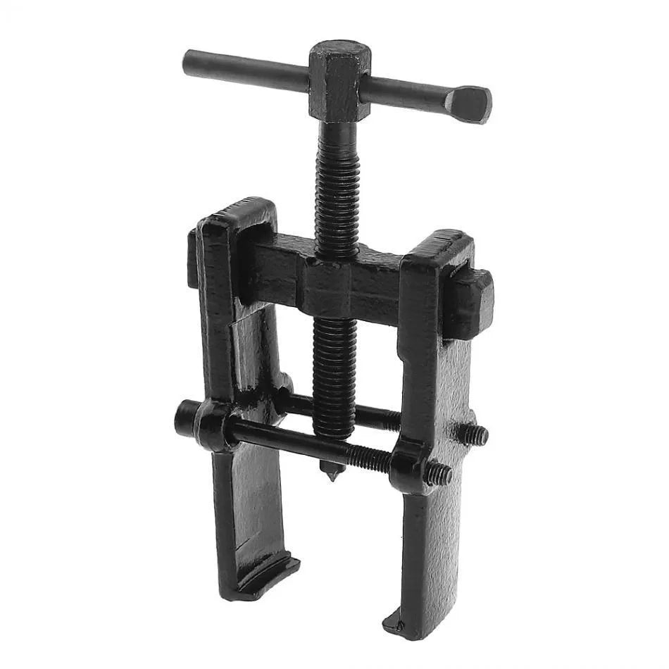 Forged steel two-jaw bearing puller with black finish, showing steel plate and jaws