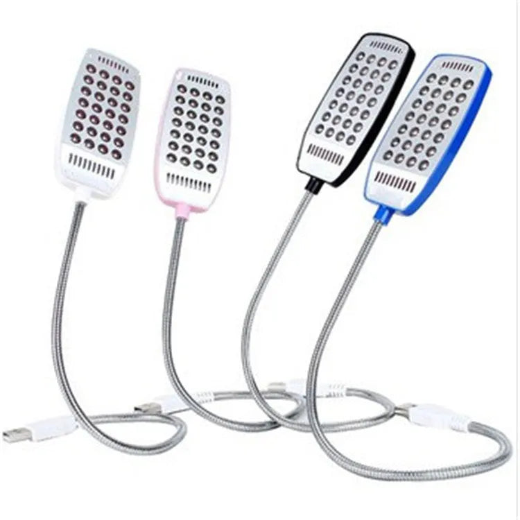 Black flexible gooseneck USB LED lamp with clip, illuminating a book.