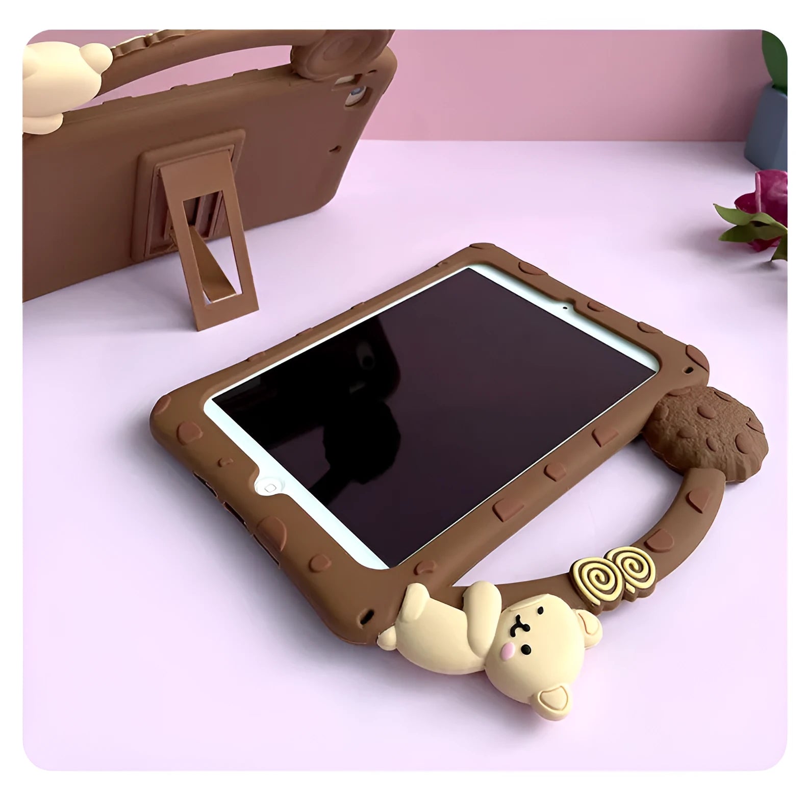 Brown cartoon-design silicone sleeve for iPad with an integrated folding stand bracket.
