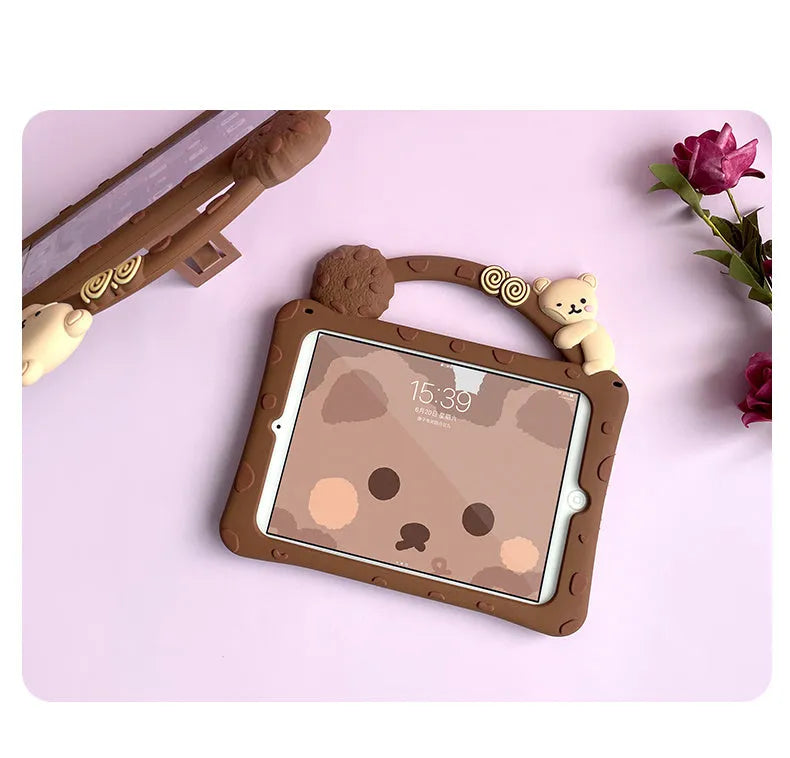 Brown cartoon-design silicone sleeve for iPad with an integrated folding stand bracket.