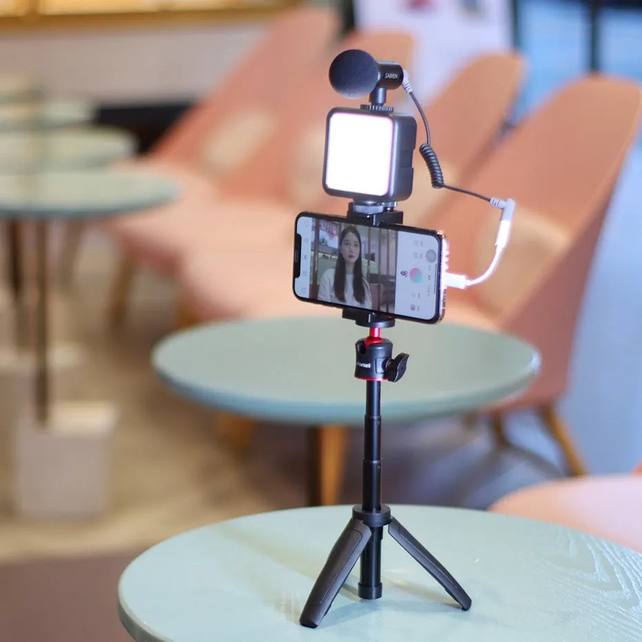 Mobile phone vlog selfie stick set with adjustable fill light bracket and phone stand.