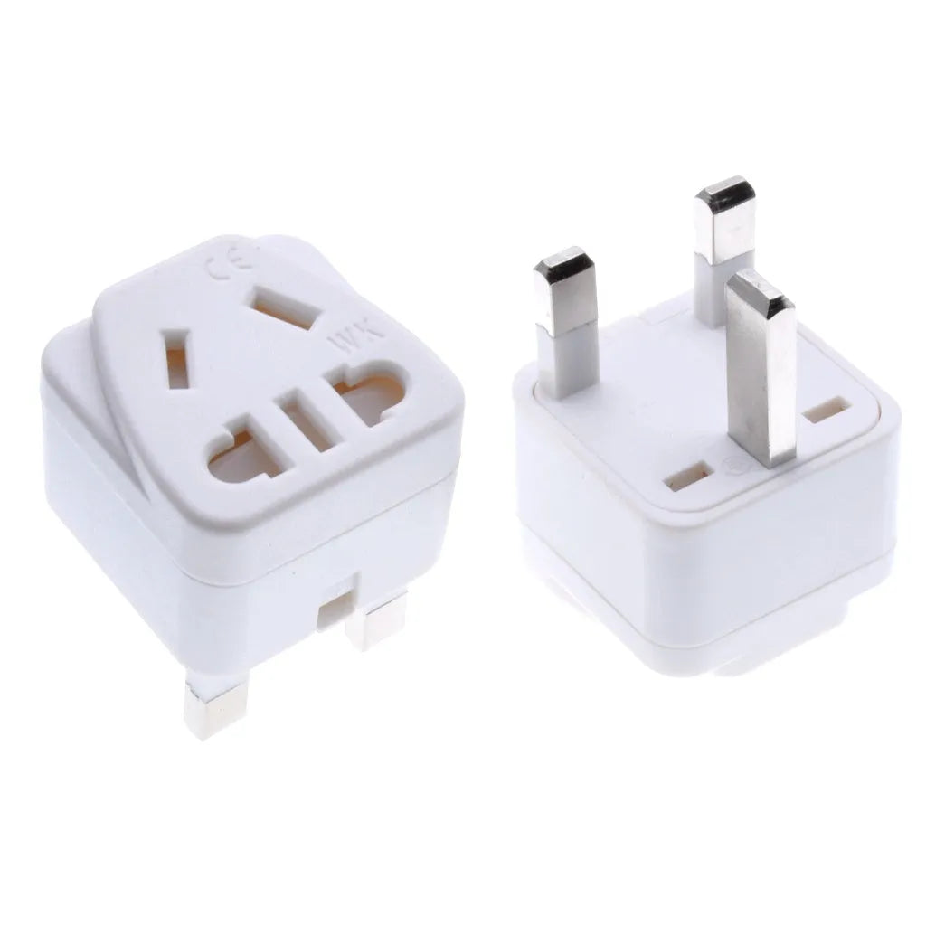 White international travel power adapter with UK three-pin plug and five sockets for 2-pin plugs.
