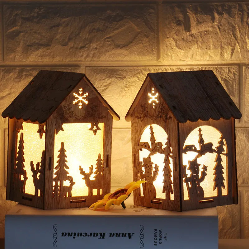 Set of three handmade wooden Christmas decorations: small log bell, wooden house Santa, wooden house snowman