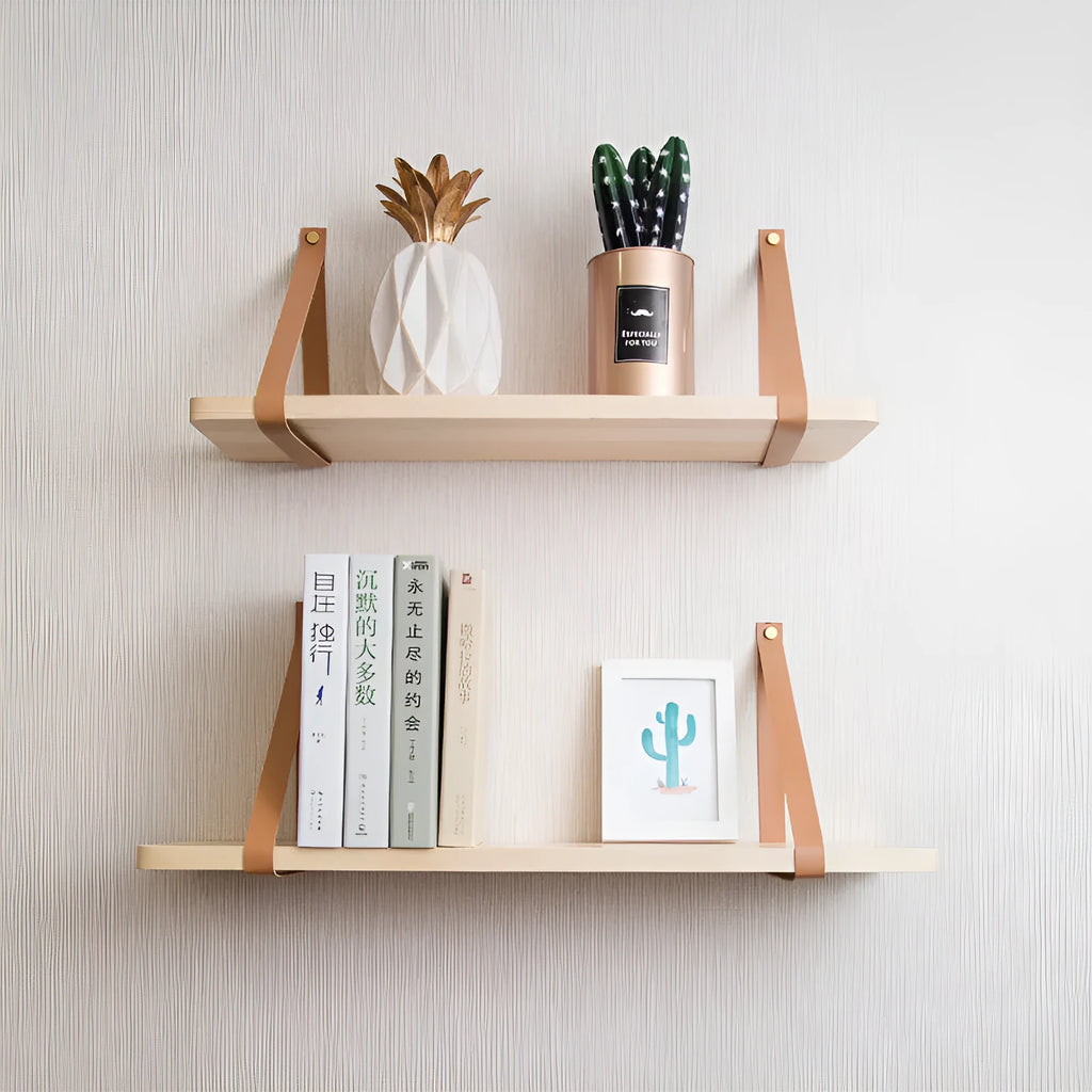 Pine wood wall-mounted storage shelf in Nordic style for organising books and remote controls.