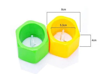 Yellow and green food-grade ABS plastic spiral vegetable cutter for slicing cucumbers.