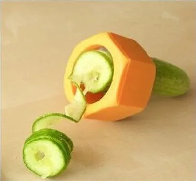 Yellow and green food-grade ABS plastic spiral vegetable cutter for slicing cucumbers.