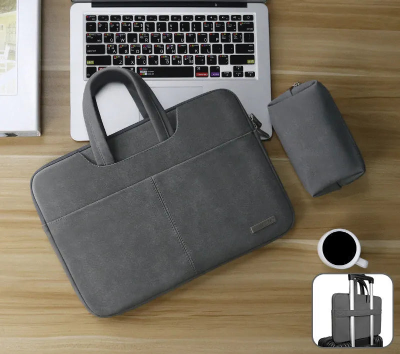 Blue waterproof PU leather laptop bag open to show internal shock-resistant liner and multiple zipper pockets for computer and phone.