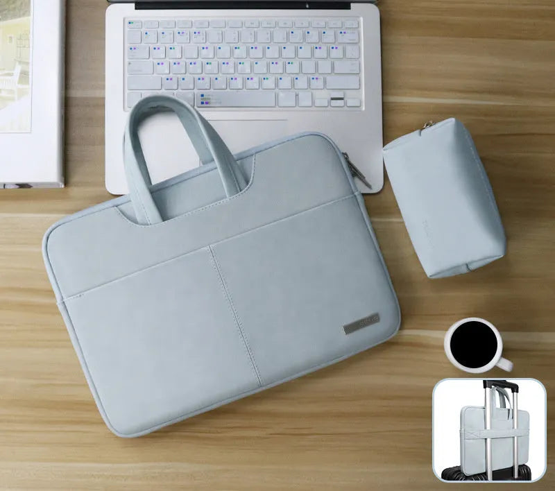 Blue waterproof PU leather laptop bag open to show internal shock-resistant liner and multiple zipper pockets for computer and phone.