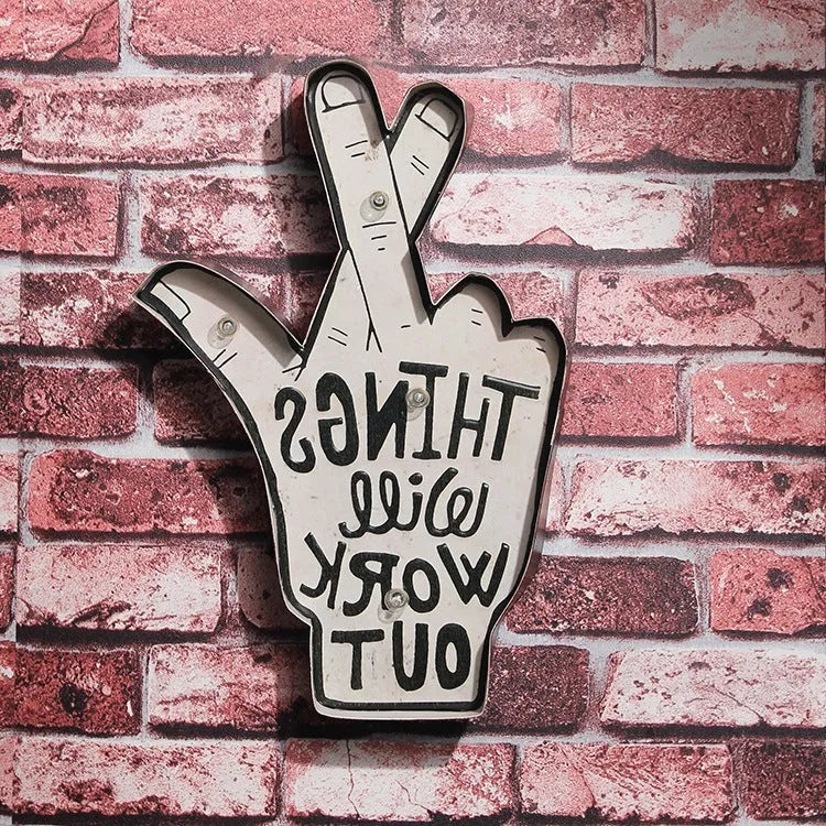 Vintage style flexible LED neon sign light on an iron frame, shown bent into a shape, for wall decoration.